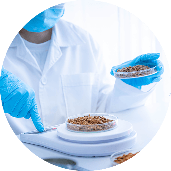 scientist weighing pet food for research
